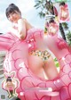 A woman in a bikini is posing in an inflatable ring.